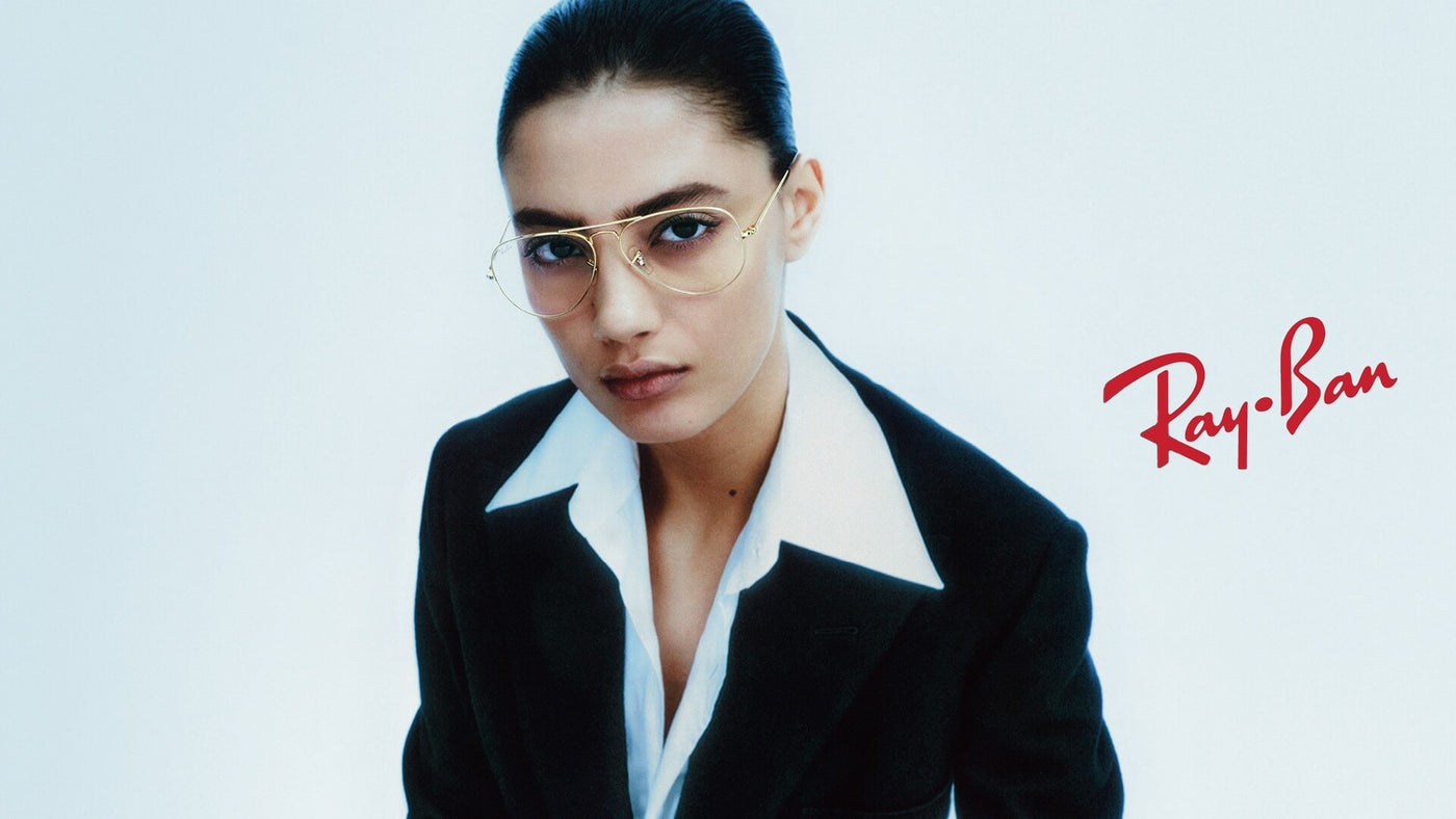 Elegant woman wearing trendy Ray-Ban glasses
