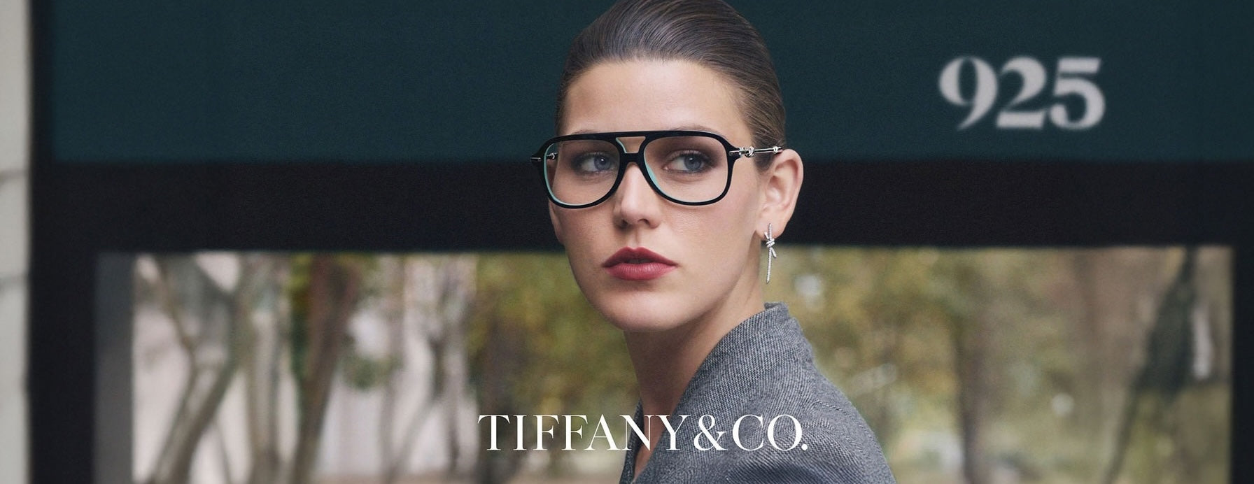 Woman wearing Tiffany glasses
