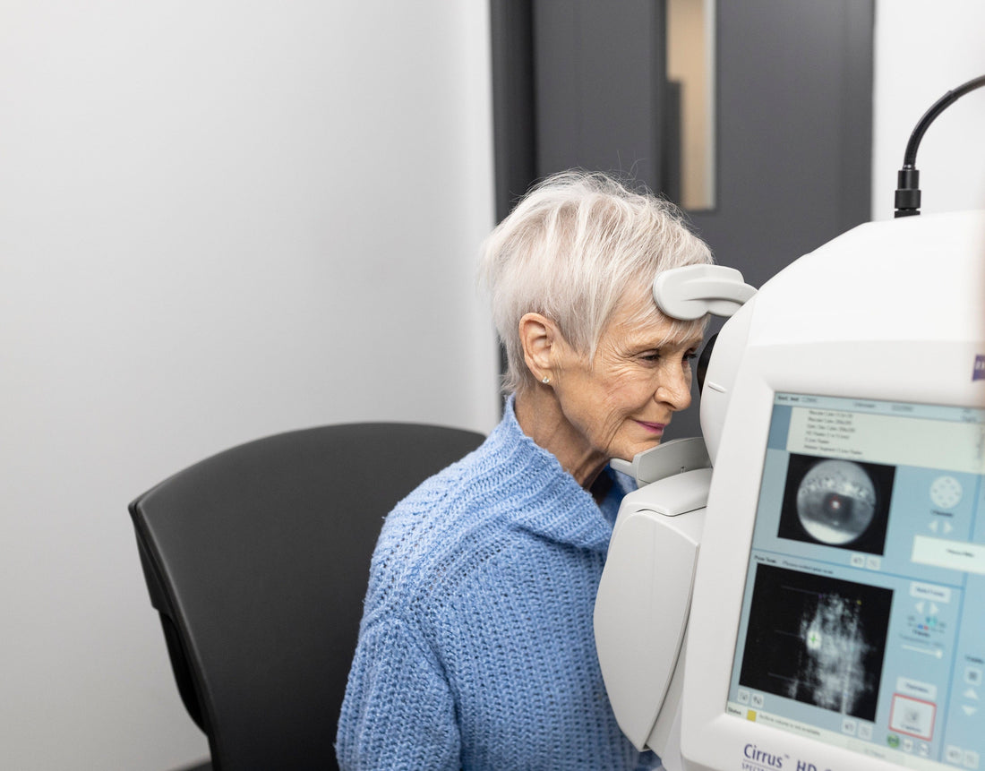A senior undergoing eye care treatment using eye technology