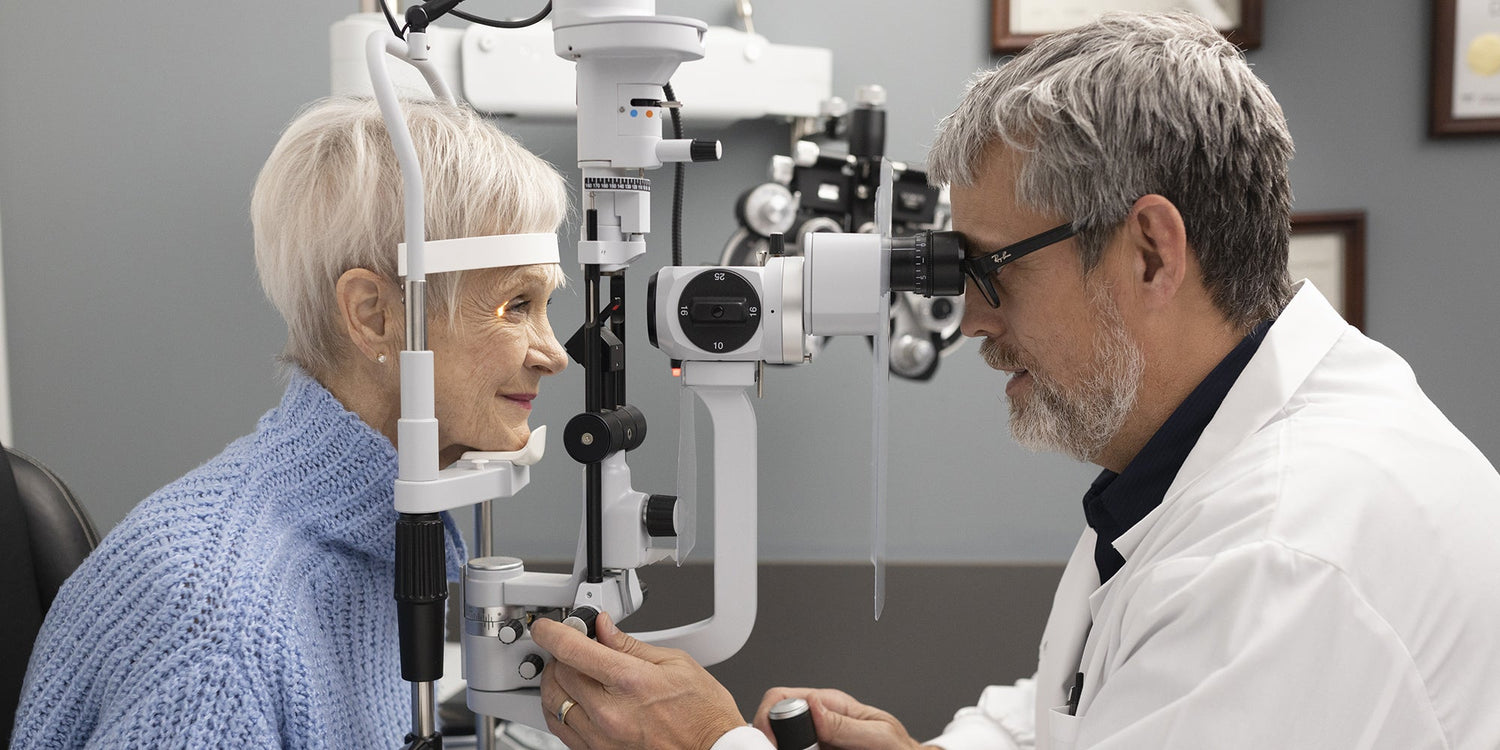 An optometrist using the latest eye technology for senior eye test